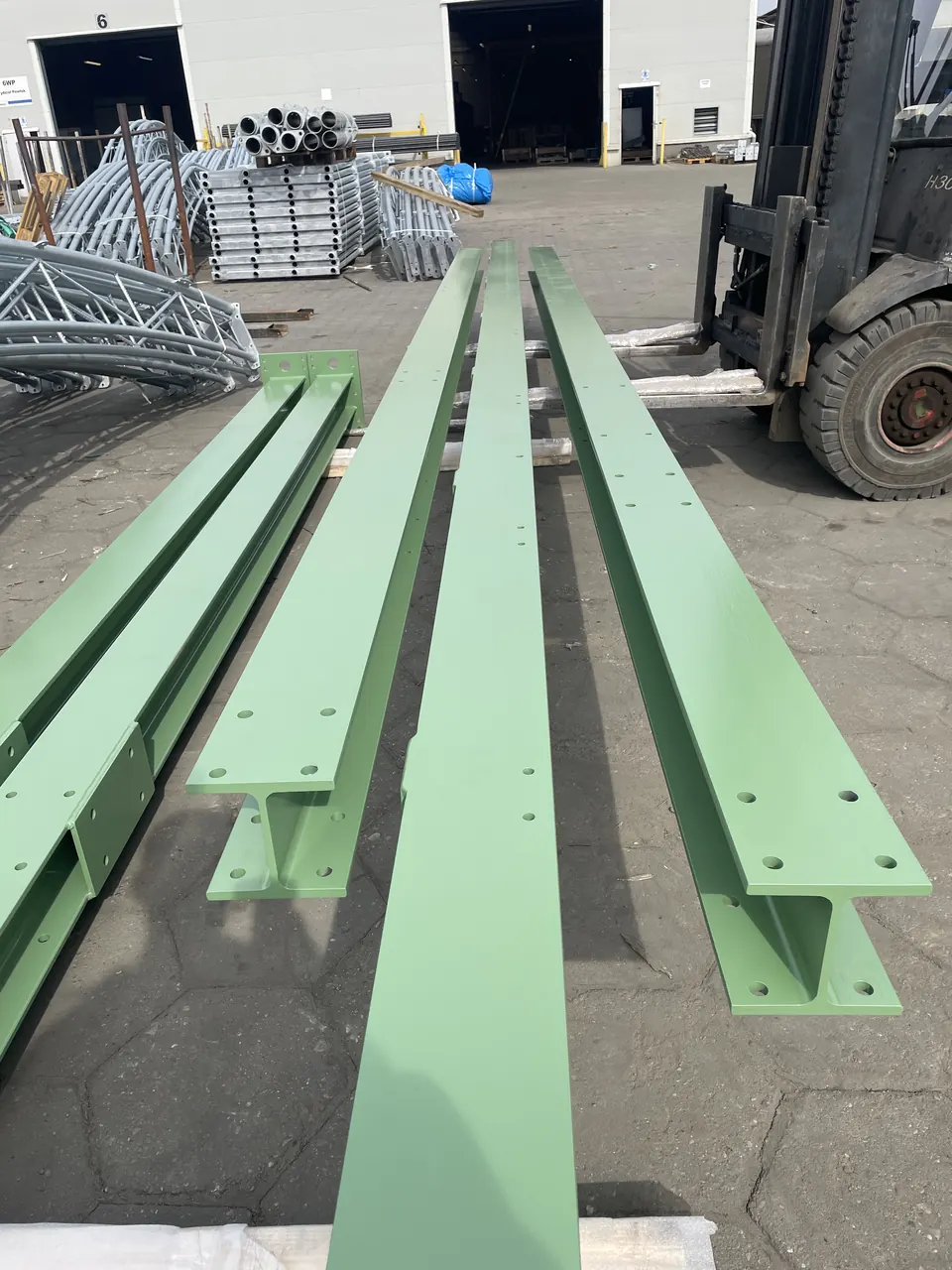 Painted I-beams with mounting holes