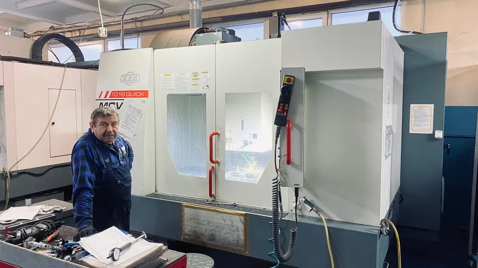 Operator at a vertical CNC milling centre