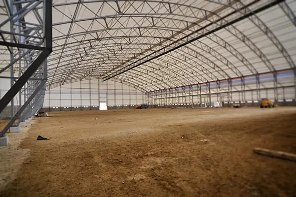 Inside the 65 × 160 m arch hall
